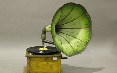 An early 20th century oak cased table-top gramophone, fitted with a green painted pressed metal horn