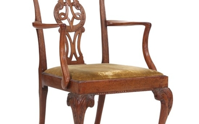An early George III mahogany armchair with claw-and-ball-feet. Loose seat. England, ca. 1760.