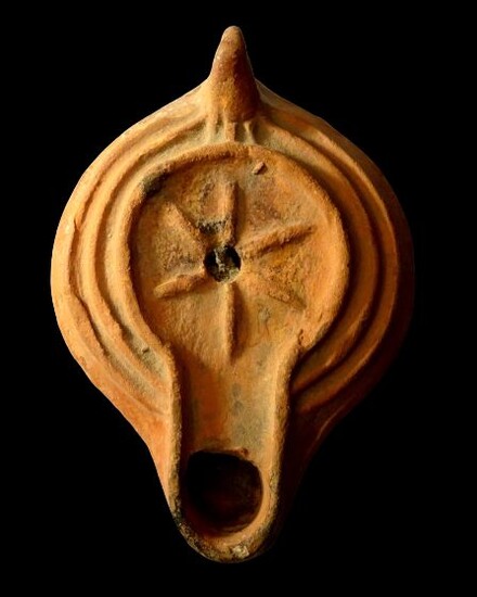 Ancient Roman sigillated - Christian oil lamp decorated with a rosette with six branches