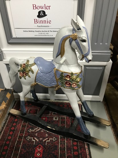 Antique hard wood ornate carved rocking horse. Painted in a ...