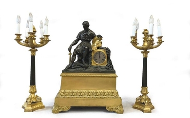 Antique patinated and gilded bronze mantel set with a clock depicting a soldier in Antiquity, helmet on the ground and two candelabra.