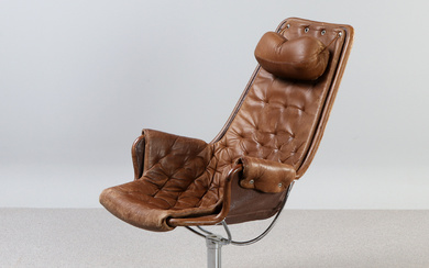 BRUNO MATHSSON. ARMCHAIR. Brown leather on chrome-plated metal frame. “Jetson”, Dux. Unmarked.