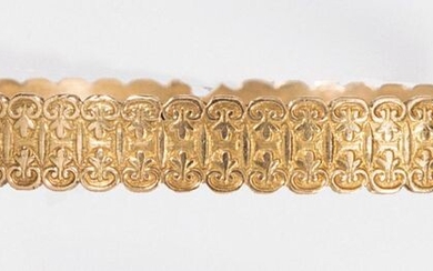 Bracelet "Rush" in chased yellow gold decorated with a frieze...