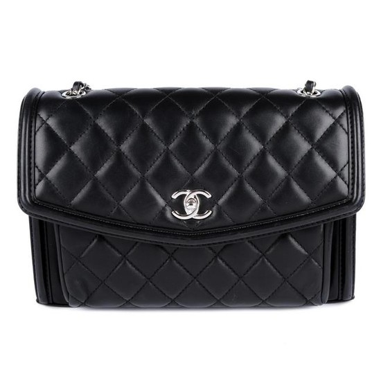 CHANEL - a black quilted leather Front Pocket Flap