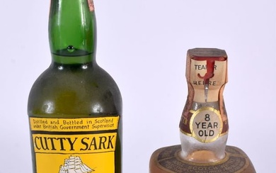 CUTTY SARK BLENDED SCOTS WHISKEY together with a White Heather 8 year old whiskey. (2)