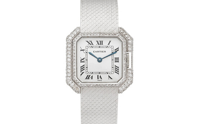 Cartier. A lady's 18K white gold diamond set manual wind bracelet watch Ceinture, Circa 1970