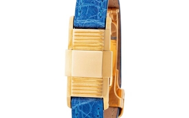 Cartier. Extremely Rare and Unusual or “Coulissant” Baguette Shape Wristwatch in Yellow Gold, With Protecting Cap