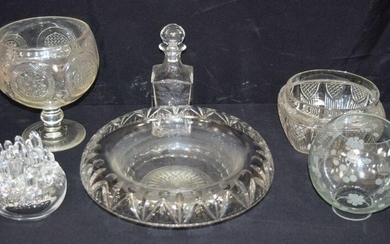 Collection of large glass items including a large table