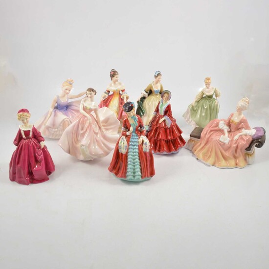 Collection of nine Worcester and Royal Doulton figurines
