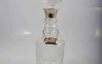 Cut-glass mallet-shape decanter with silver collar, BP Co., London 1984.