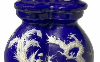 Double blue vase with relief decoration on both sides