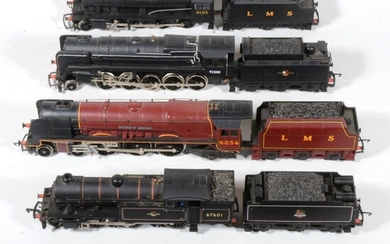 Five OO gauge model railway locomotives and a spare tender.