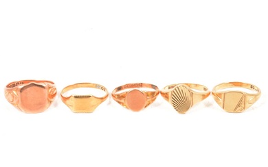 Five gold signet rings.