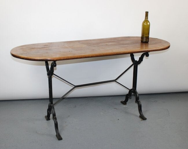 French cafe table iron base with oval walnut top