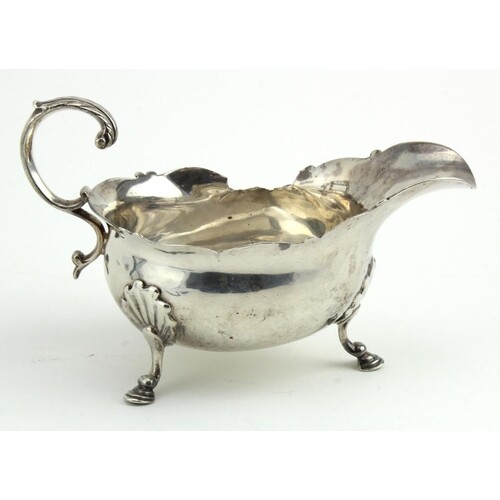 George II silver sauce boat, hallmarked for W. Shaw and W. P...