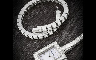 HARRY WINSTON. A LADY’S 18K WHITE GOLD AND DIAMOND-SET RECTANGULAR BRACELET WATCH WITH MOTHER-OF-PEARL DIAL AND MATCHING BRACELET SEMIRA MODEL, CIRCA 2009