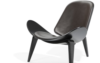 Hans J. Wegner: “CH 07”. Three-legged black lacquered shell chair with form-pressed laminated frame. Manufactured by Carl Hansen & Son.