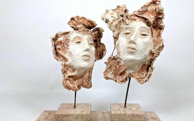KIKI RISKIN Clay sculptural female heads on stands. Fig