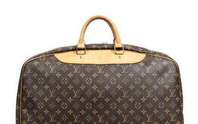 LOUIS VUITTON, ALIZE SUITCASE Please note all purchases will arrive in the Melbourne show room 10 days after purchase.