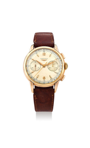 Longines. A Yellow Gold Chronograph Wristwatch with Faceted Lugs