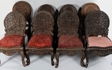 MATCHED SET OF SIX BURMESE CARVED TEAK SIDE CHAIRS, EARLY 20TH CENTURY