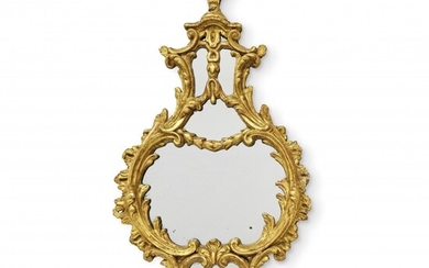 MIROIR 18e-19e siècle Bois sculpté et doré et miroirs, en forme de goutte. Fissures dans...