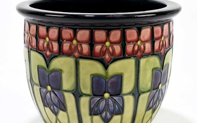 MOORCROFT; a jardinière decorated in 'Violet' pattern, impressed marks and...
