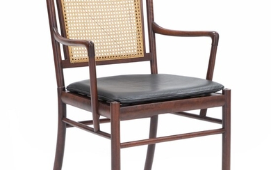 SOLD. Ole Wanscher: “Colonial”. Armchair of mahogany. Loose cushion in seat upholstered with black leather. Manfuactured and marked by P. Jeppesen. – Bruun Rasmussen Auctioneers of Fine Art