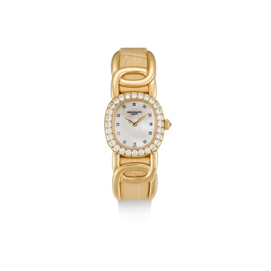 PATEK PHILIPPE | GOLDEN ELLIPSE, REFERENCE 4931 A YELLOW GOLD AND DIAMOND-SET WRISTWATCH WITH MOTHER-OF-PEARL DIAL, MADE IN 2000