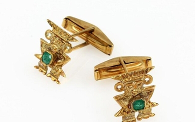 Pair of 14 kt gold cuff links with emeralds