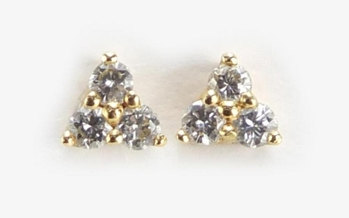 Pair of 18ct gold diamond earrings, 0.8g