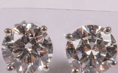 Pair of Platinum and Diamond Solitaire Stud Earrings