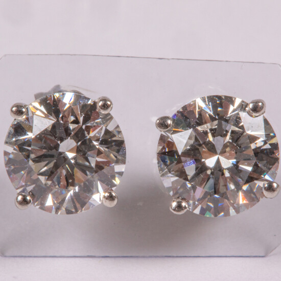 Pair of Platinum and Diamond Solitaire Stud Earrings