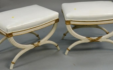 Pair of benches with white leather tops on cruel bases.