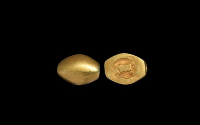 Phoenician Gold Scaraboid with Two Fish