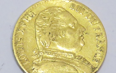 Pièce en or de 20 Francs "Louis XVIII, Buste habillé-Roi des français" datée de 1814,...