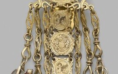Pomponne chain with five medallions decorated with attributes...