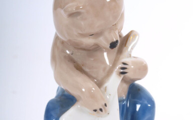 Porcelain figurine "Bear with balalaika" Second half of 20th century. Porcelain factory of Gorodnicka, author of the model T.Križanovkskaja, Russia. Porcelain. Height 8 cm