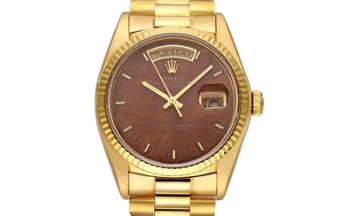 Rolex Reference 18038 Day-Date | A yellow gold automatic wristwatch with day, date, bracelet, and burl wood dial, Circa 1980