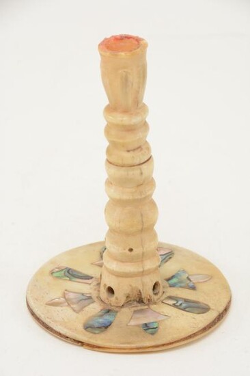 Scrimshaw candlestick with tuned stem set on round base