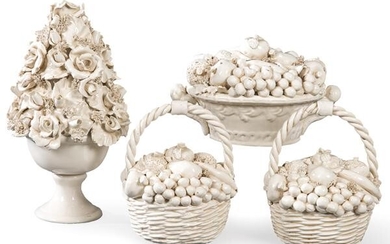 Set of four white enameled earthenware centerpieces