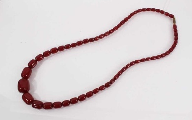 Simulated cherry amber necklace with graduating polished oblong beads