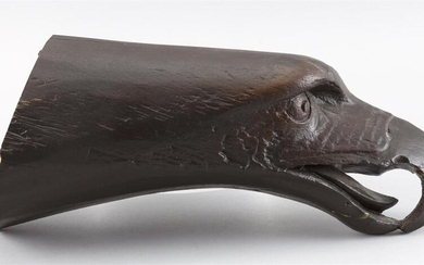 AN EAGLE'S HEAD 20th Century Resin. Painted brown....