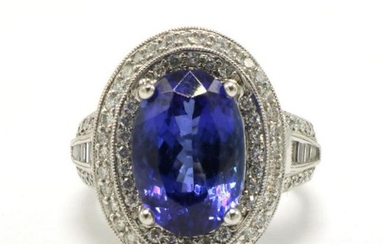Stunning 18Kt 6.54ct. Vivid Tanzanite and Diamond Ring