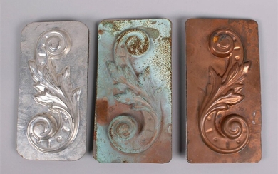 THREE COPPER AND TIN ARCHITECTURAL SCROLLS WITH ACANTHUS LEAF CARAMEL MOLDS, LATE 19TH/EARLY 20TH CENTURY