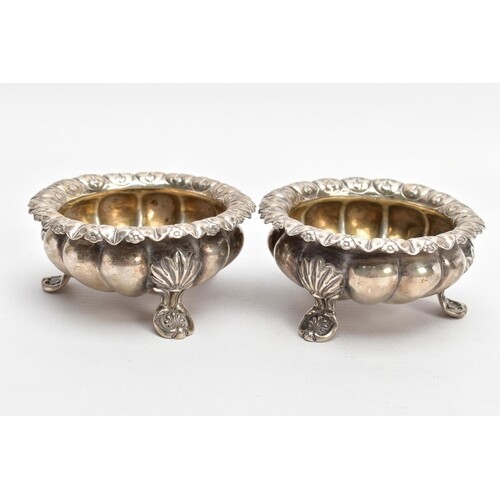 TWO SILVER BONBON DISHES, each with an embossed bowl, worn g...