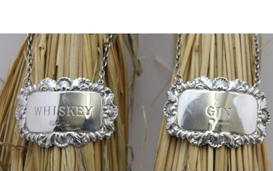 TWO SILVER DECANTER LABELS, 'Whiskey' & 'Gin', combined weig...
