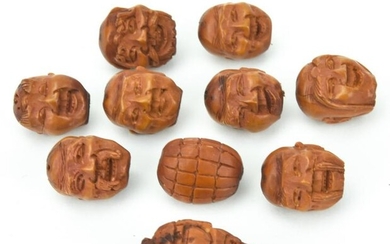 Ten Antique Chinese Hand Carved Peach Pit Beads