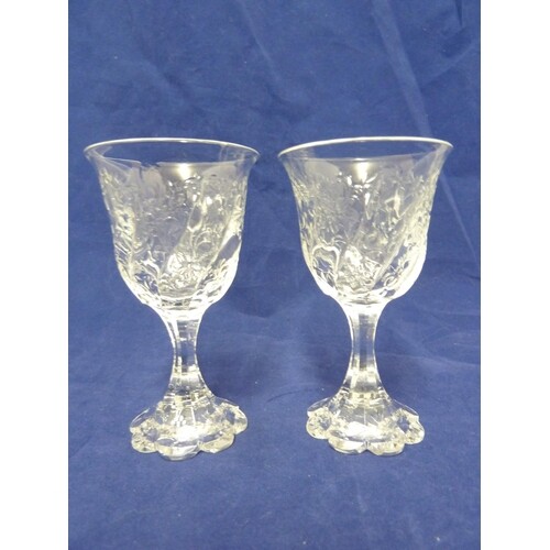 Thomas Webb - a pair of rock crystal wine glasses, the bowls...