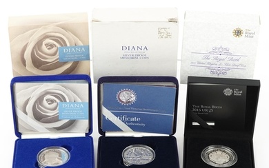 Three commemorative silver proof coins with fitted cases and...